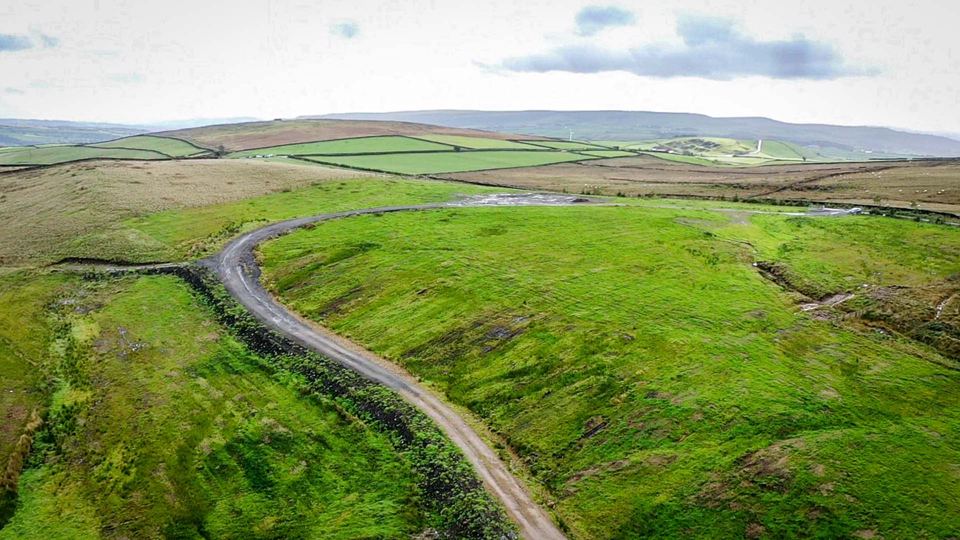 Moorland track above the site