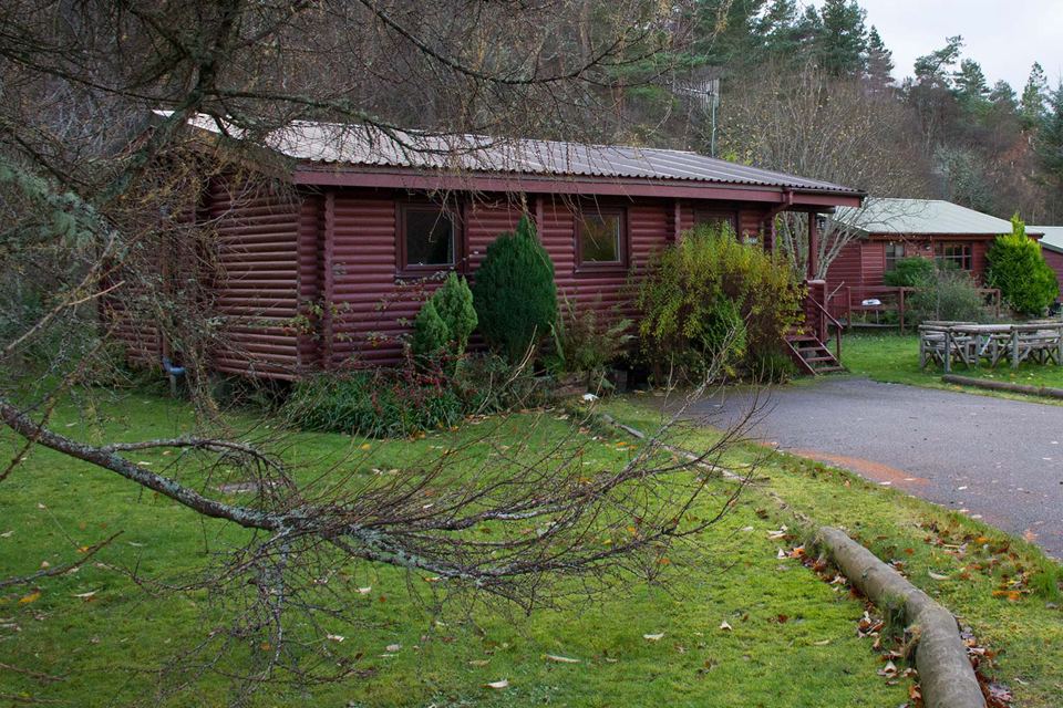 Log cabin on the lawn