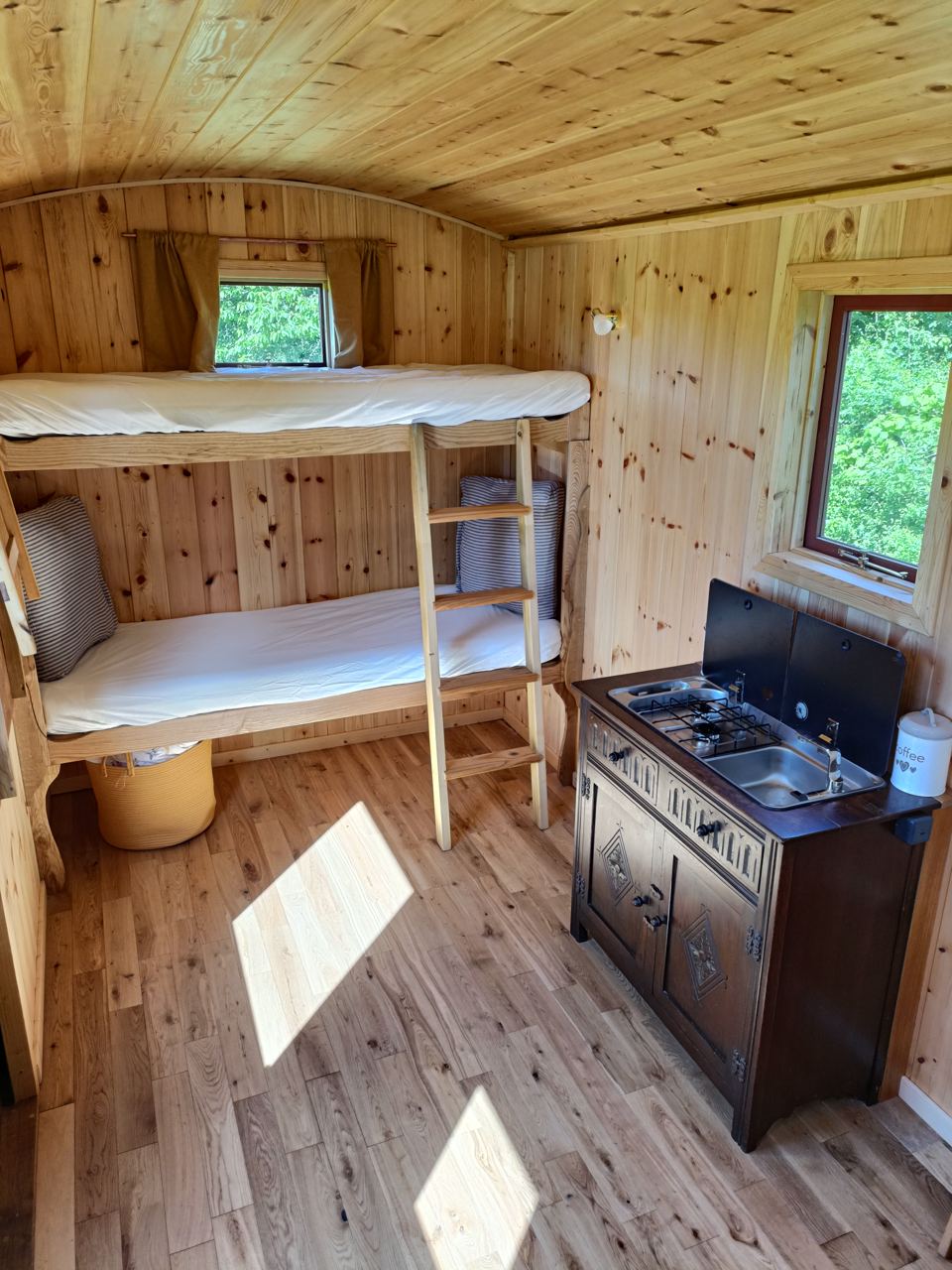 Bunk beds and stove in the Wagon