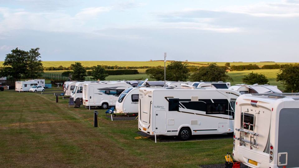Motorhomes on level grass