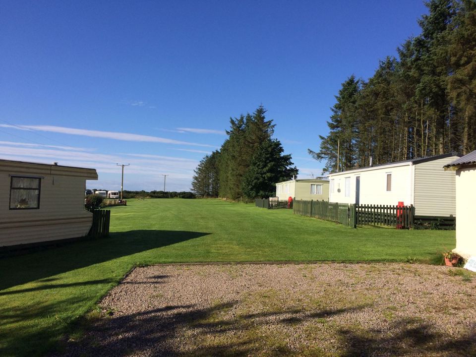 Gravel pitch beside the grass