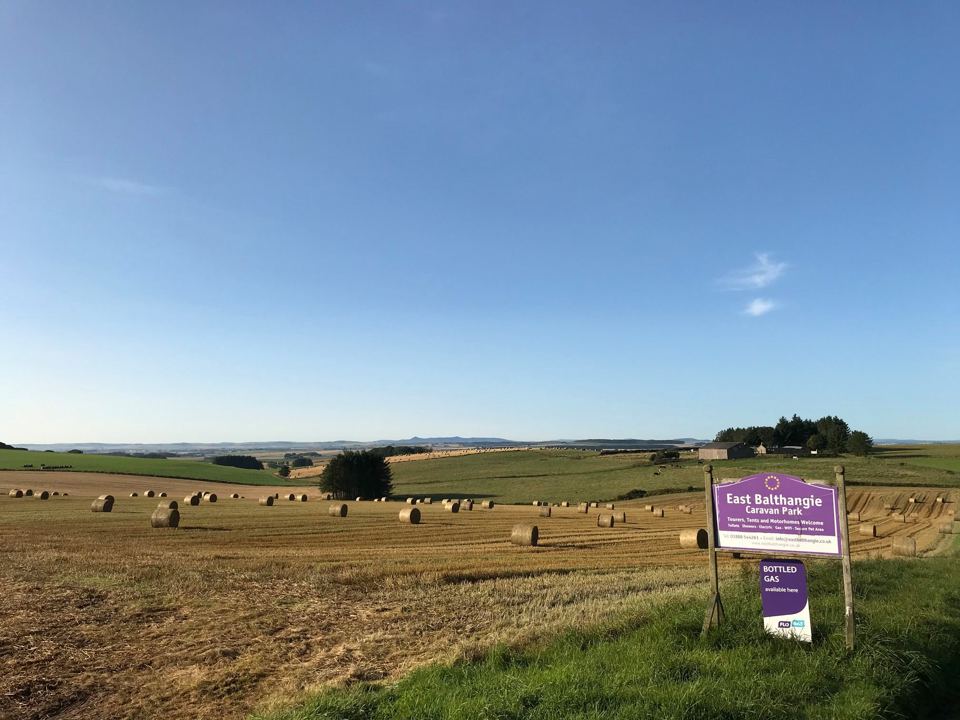 Farmland beyond the site entrance