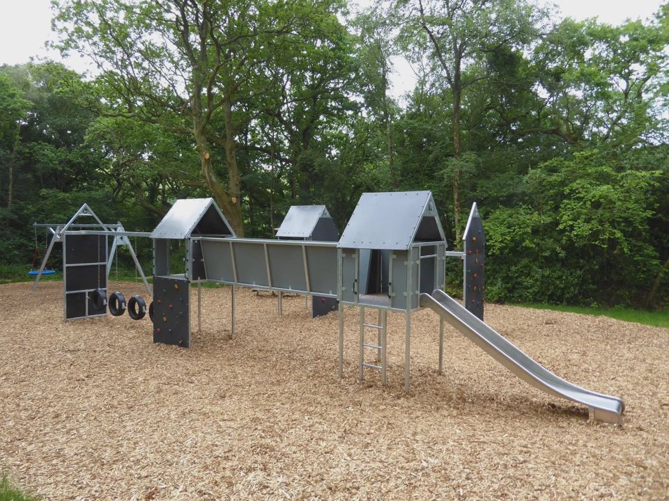 Play area with slide