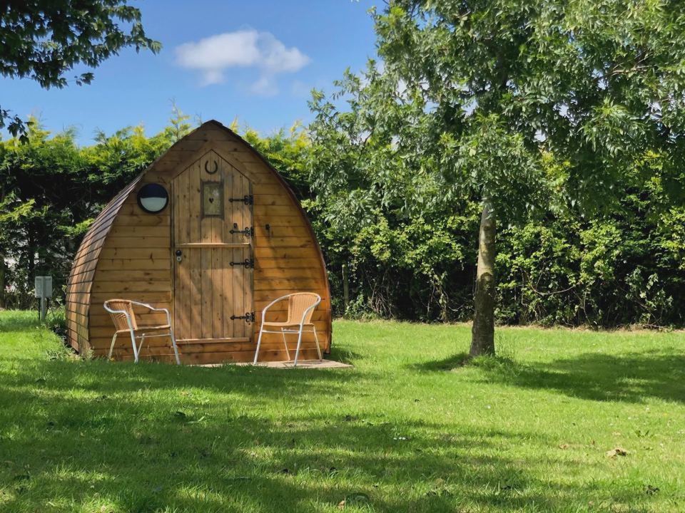 Camping pod with two chairs