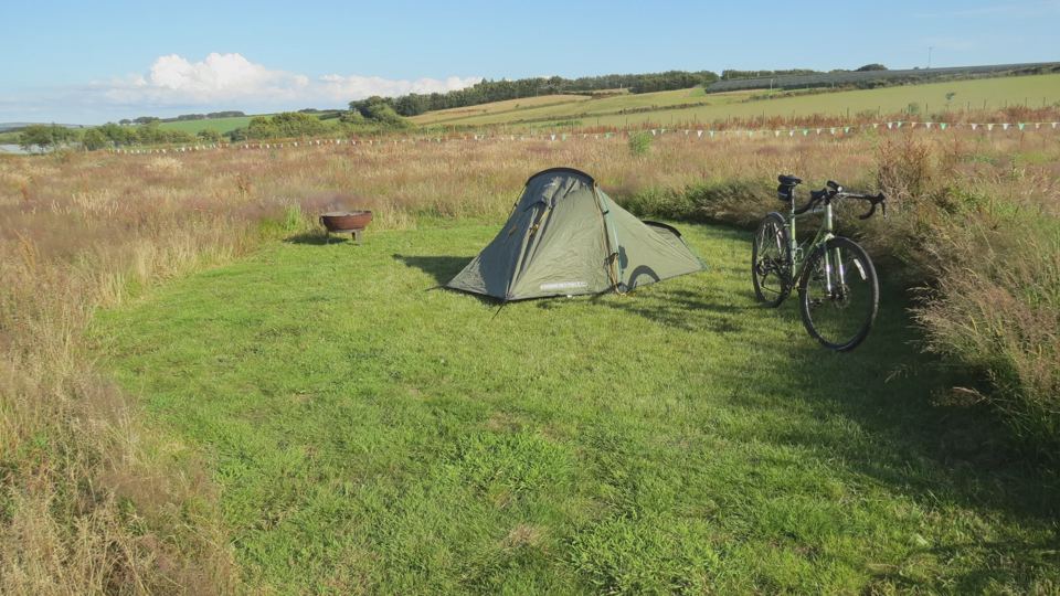 Tent pitch with bicycle
