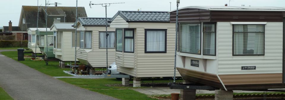 Row of caravans along a path
