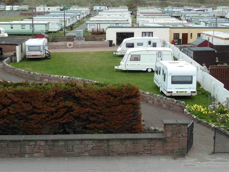 Tourers on the grass paddock