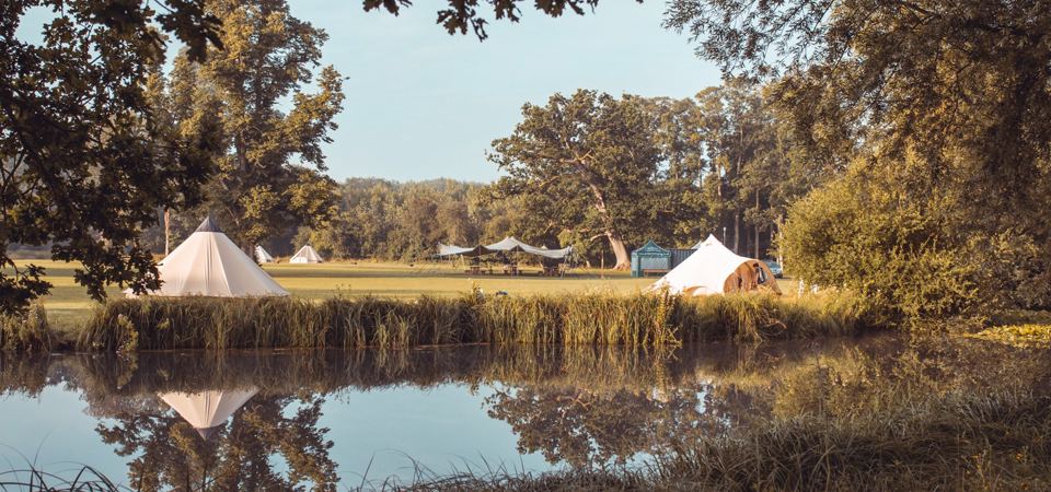 Bell tents beside the water
