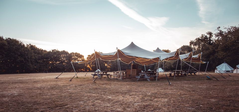 Communal tent beside the field