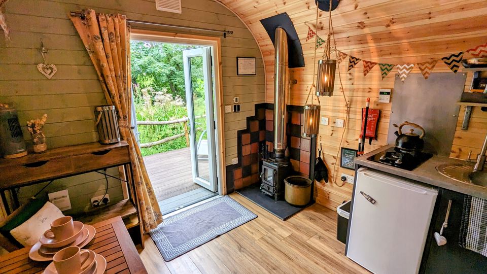 Pod interior with log burner