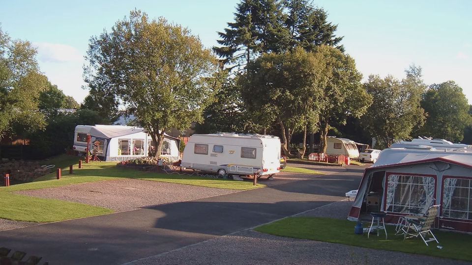 Awnings on the pitches under trees