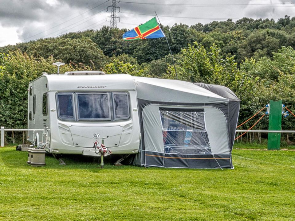 Caravan and awning on grass