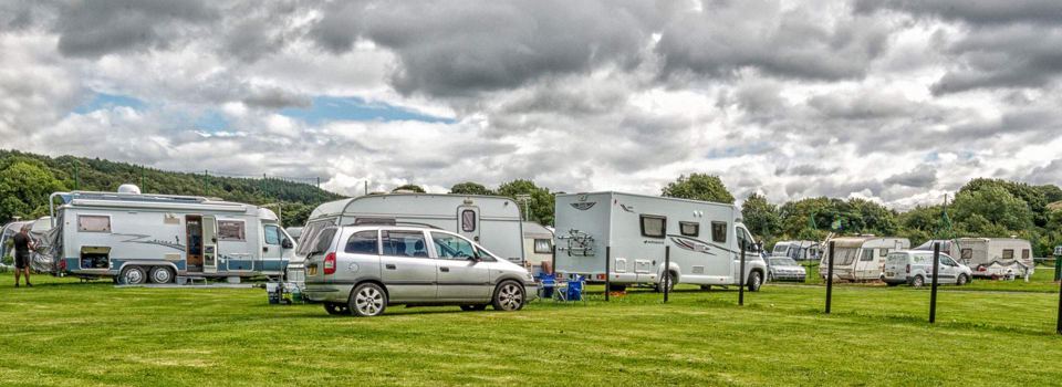 Motorhomes and caravans on the field