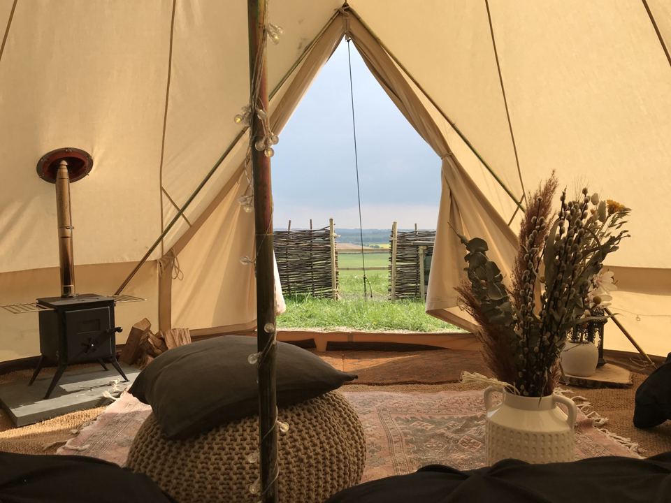 Tent interior looking out to the fields