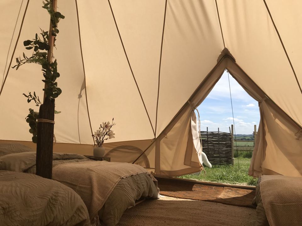 Single beds inside a bell tent