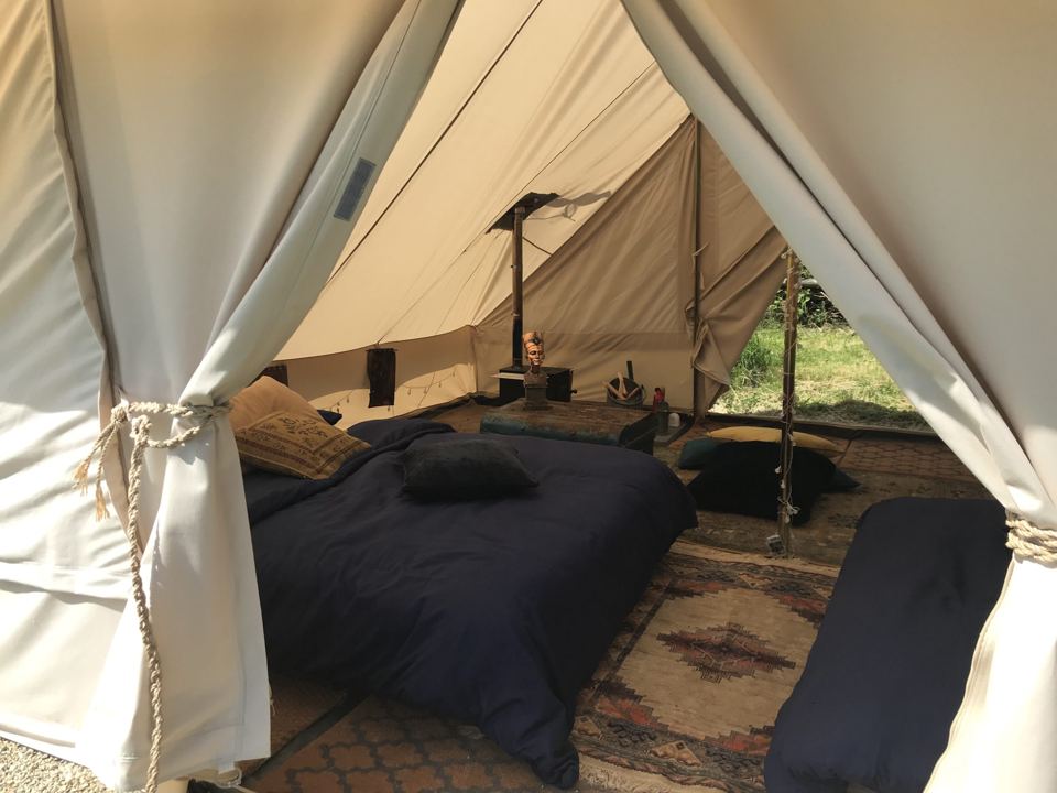 Double bed and single in tent