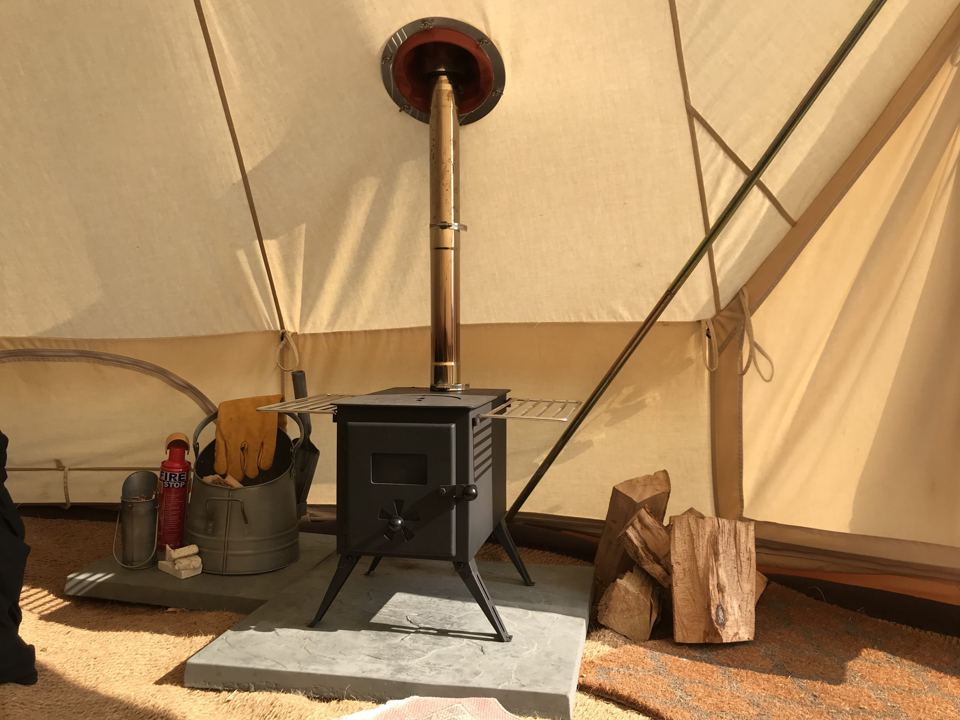 Woodburner inside a bell tent