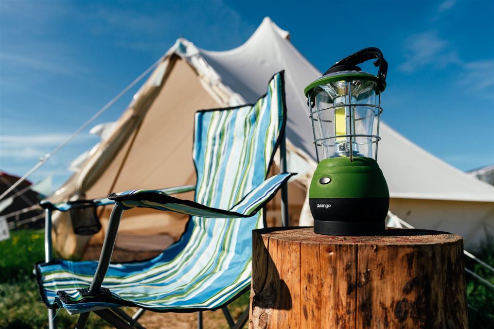 Bell tent with lantern and chair