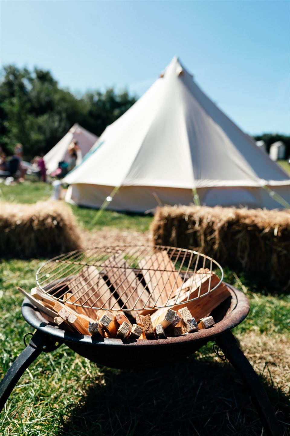 Fire pit outside a bell tent