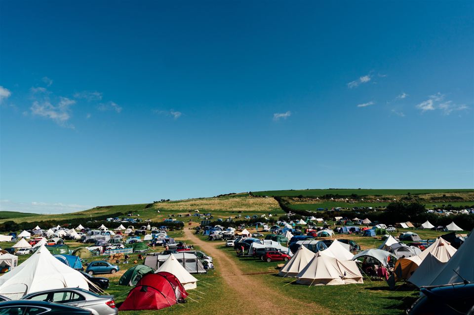 Campers across the hillside