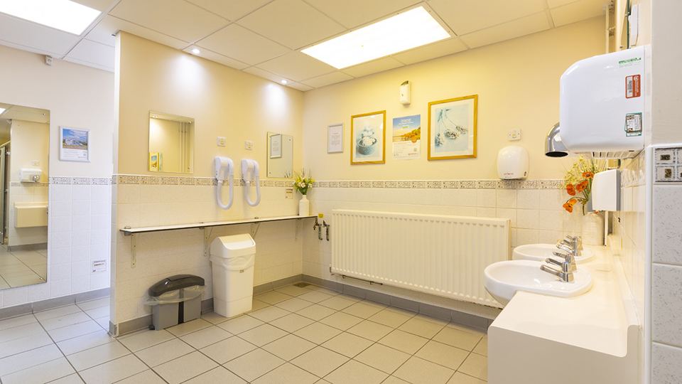 Inside the washroom with basins