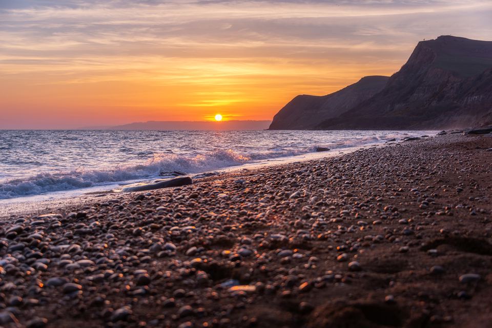Pebble beach at sunset