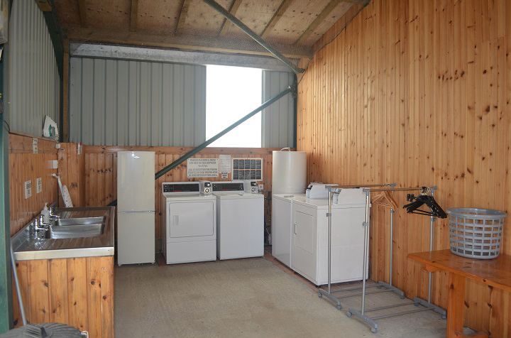 Laundry room with washers and dryers