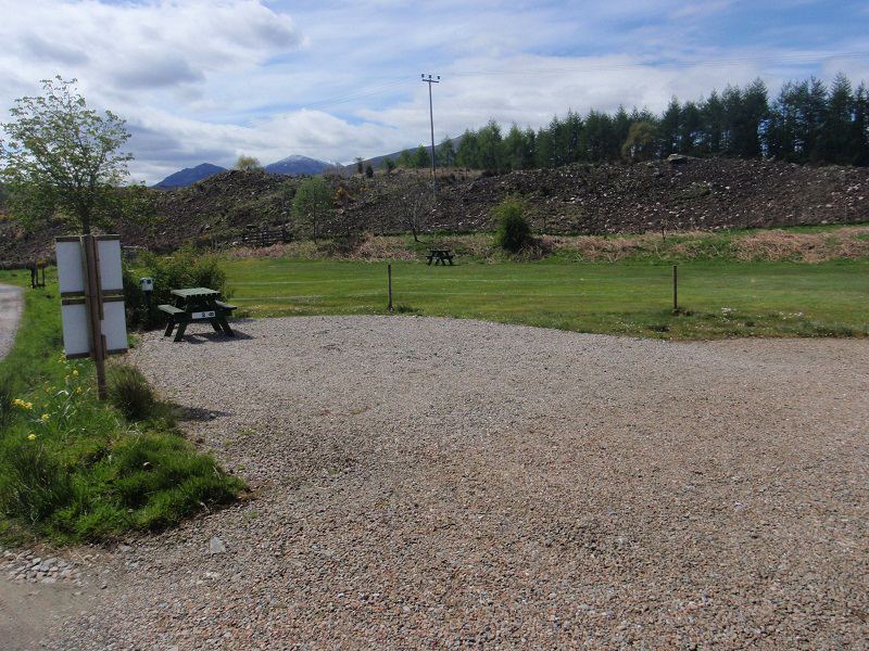 Gravel pitches beside the hillside