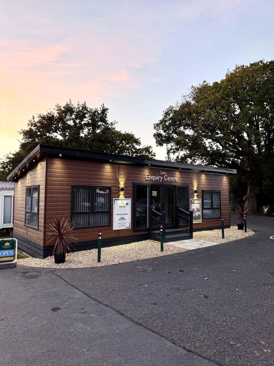 Sales enquiry centre at dusk