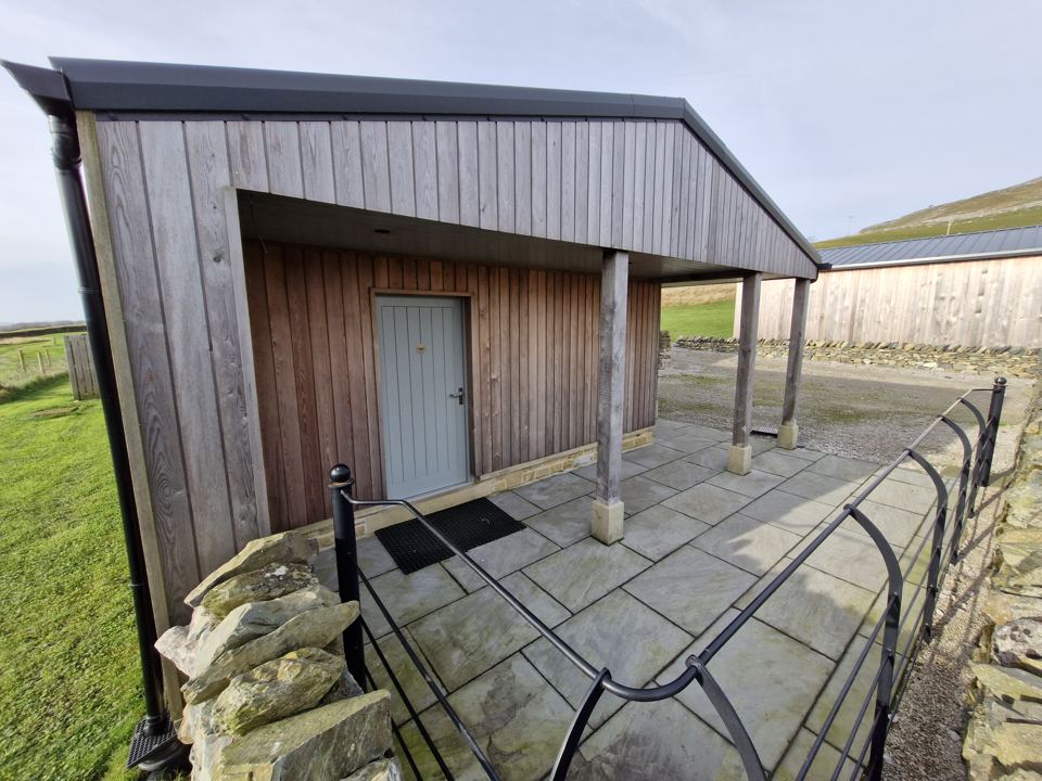 Timber building on site