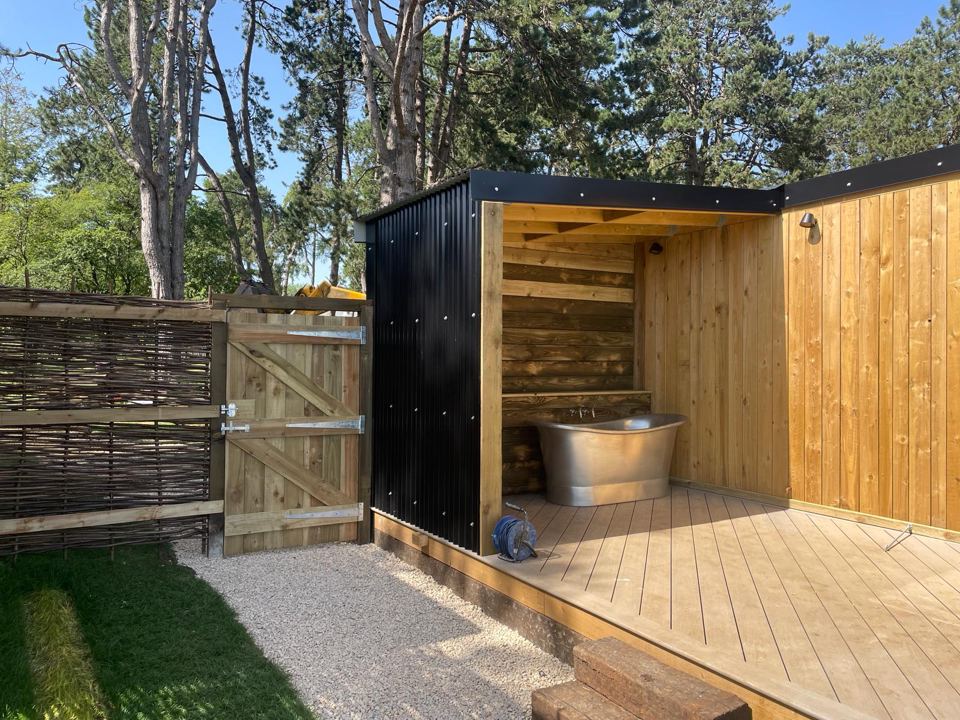 Outdoor bath on cabin decking