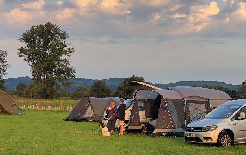 Tent and awning on the grass pitch