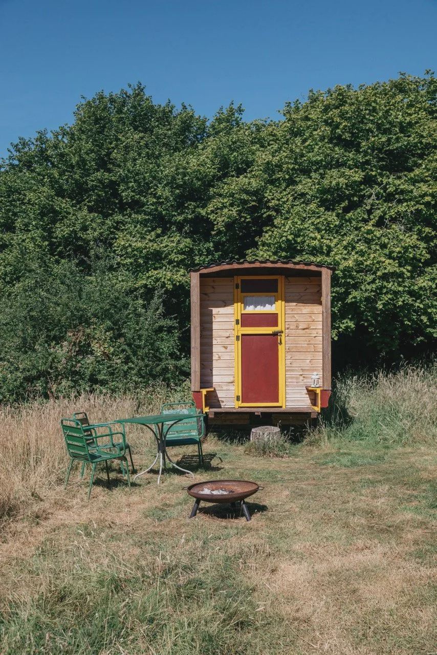 Shepherd's hut with fire pit