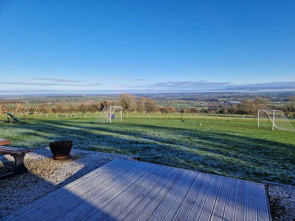 Deck and fire pit over the valley