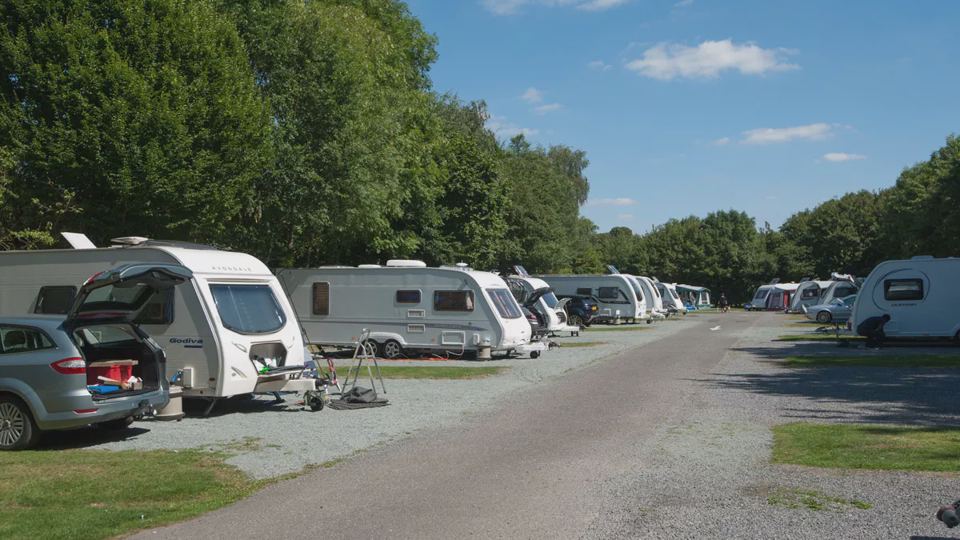 Row of caravans on gravel