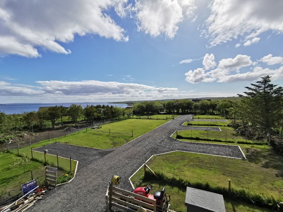Pitches and the sea beyond