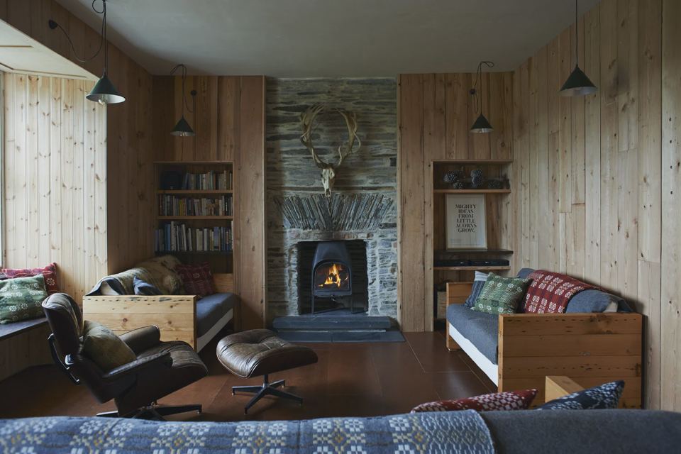 Farmhouse sitting room with stove