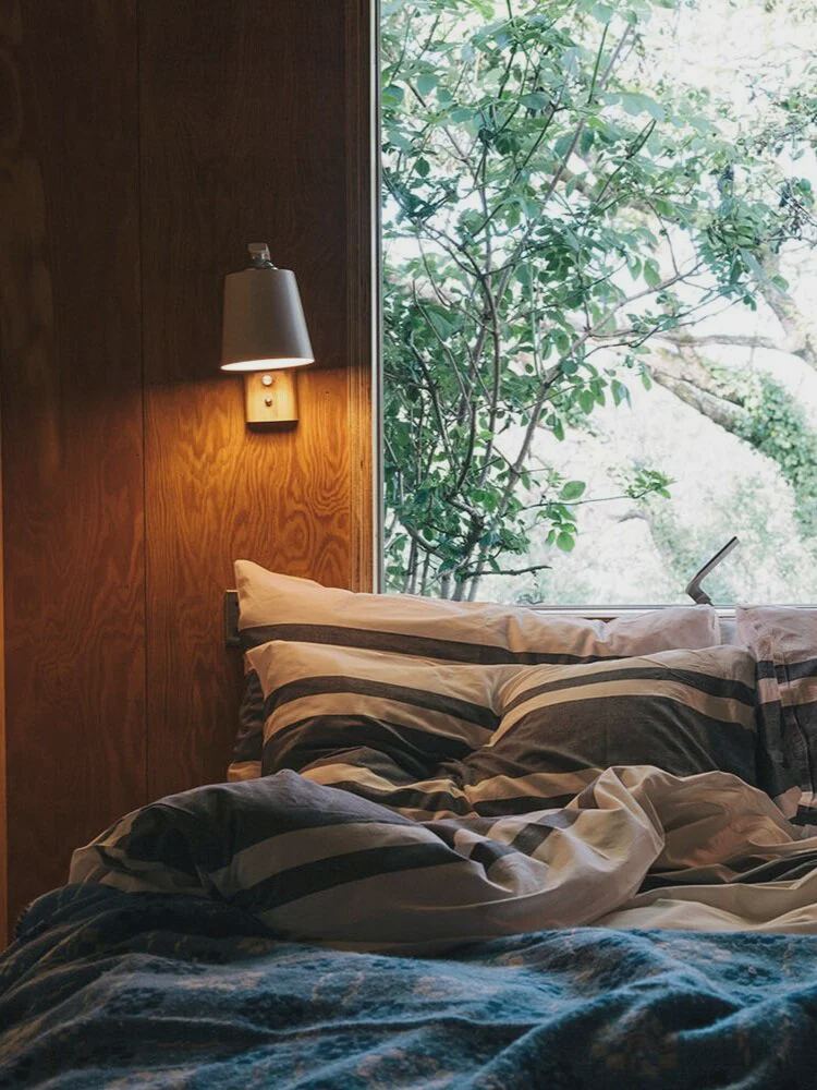 Bed by the window