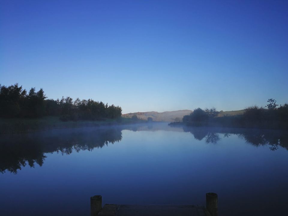 Still lake at dawn