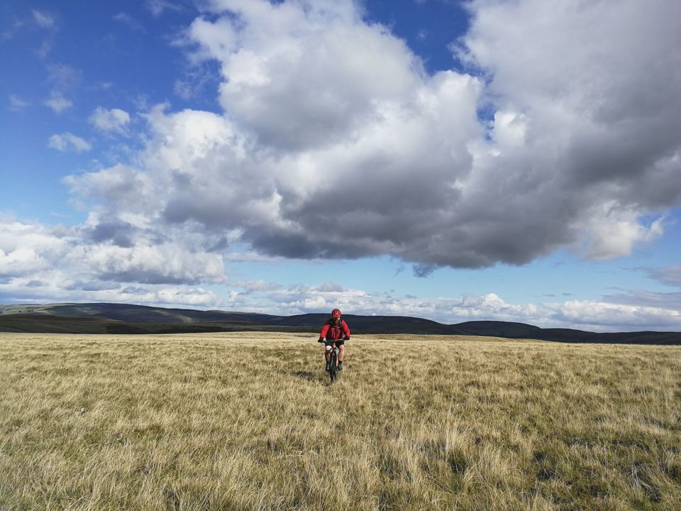 Cyclist on the open moorland
