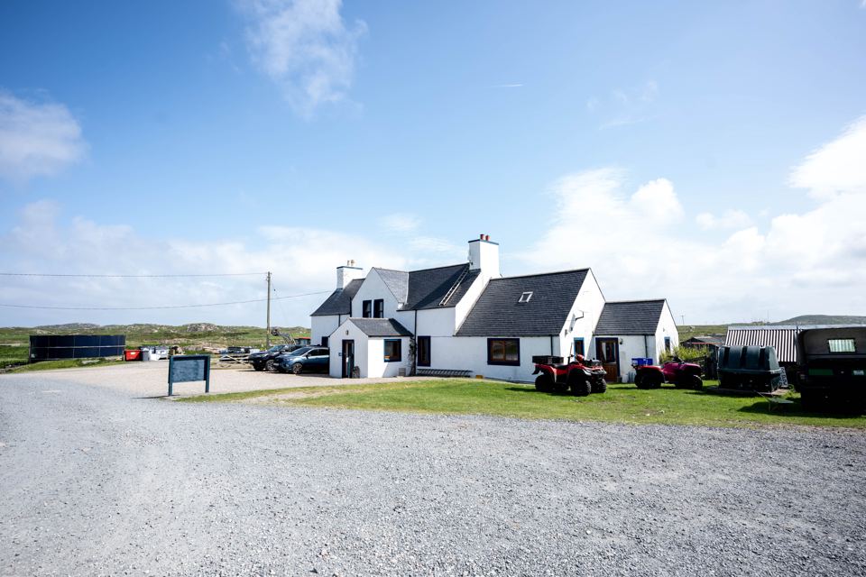 Farmhouse and gravel yard