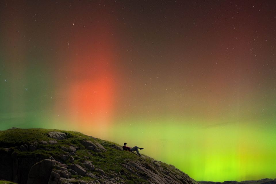 Northern lights over the rocks