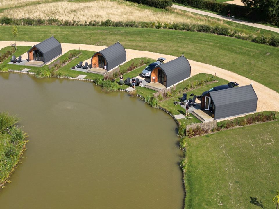 Glamping pods along the water