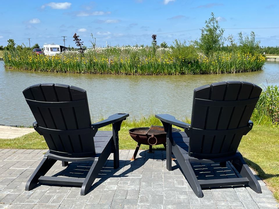 Fire pit seats by the lake
