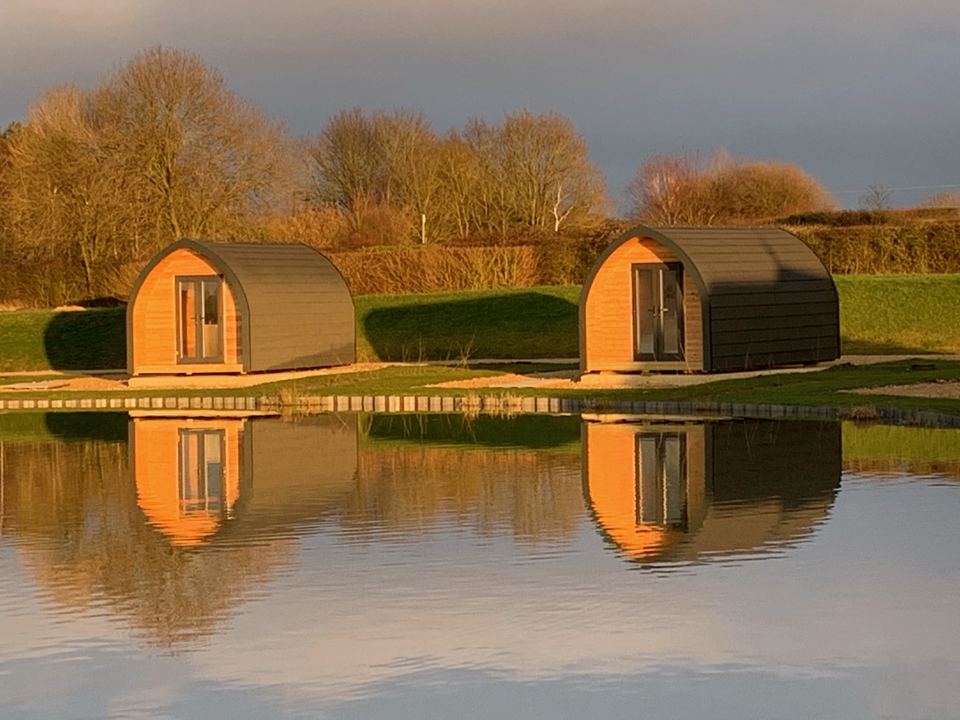 Pods reflected in the water