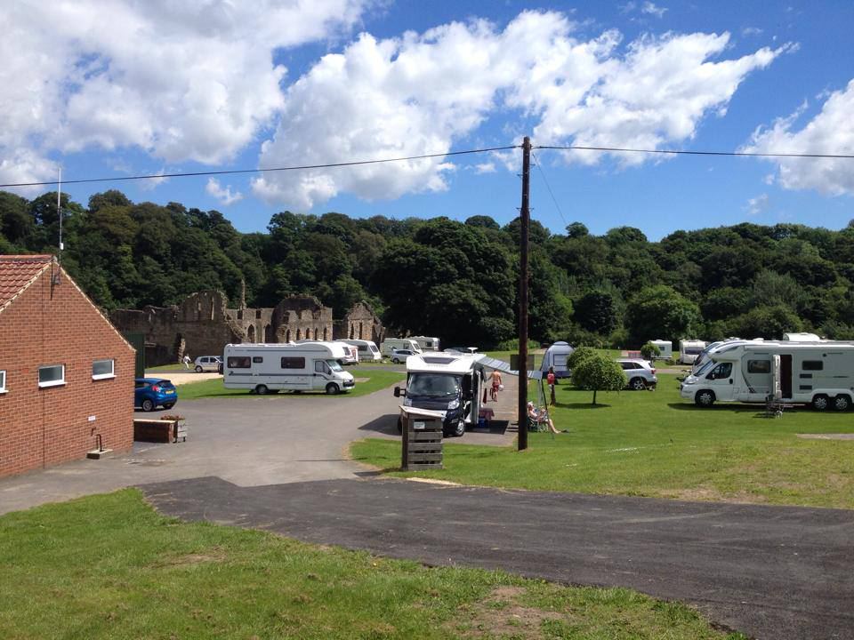 Touring pitches beside the abbey