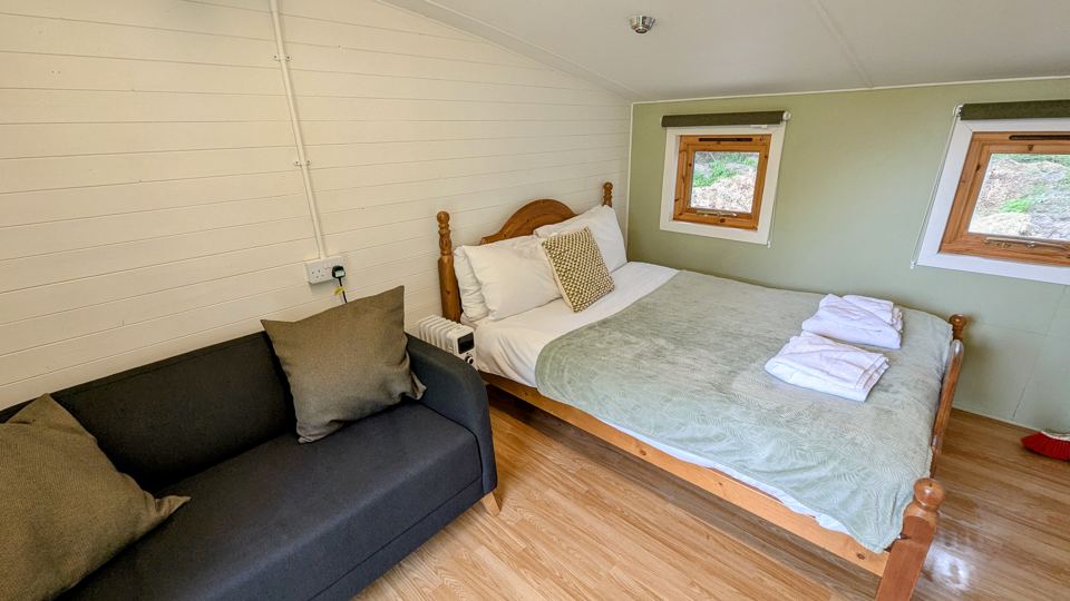 Bedroom with sofa