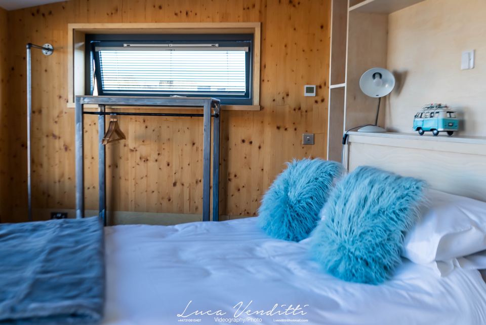 Bed with timber walls