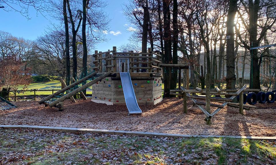 Play frame among the trees
