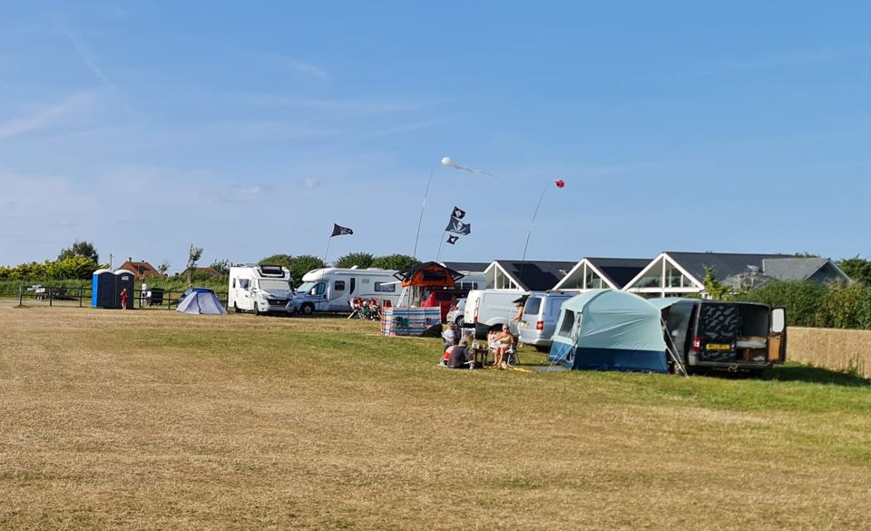 Tents and vans on the field